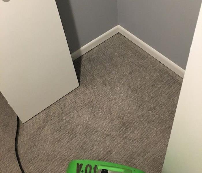  Corner with SERVPRO drying equipment on carpet