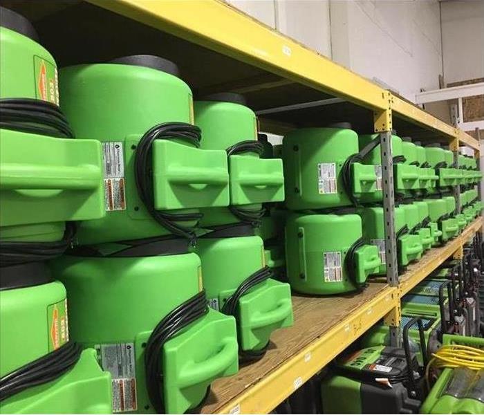 Our new green equipment on the shelves in the warehouse