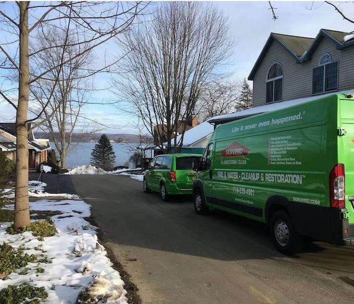 SERVPRO vehicle parked in front of home