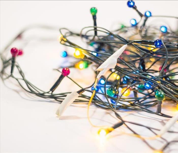 wires rewound with electrical tape on a Christmas garland.