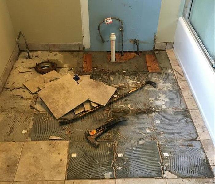tile and floor damage from sewage backup