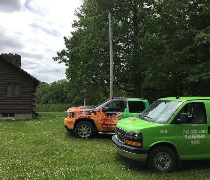 SERVPRO vehicles parked outside of home