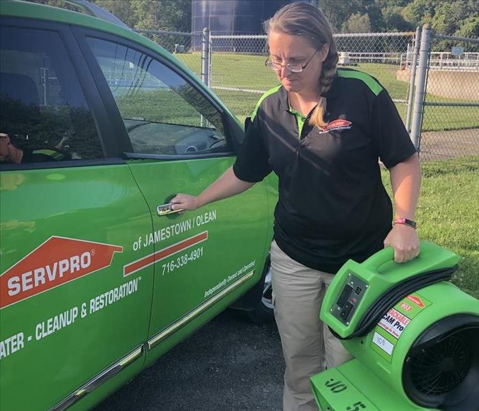 SERVPRO technician with equipment in hand